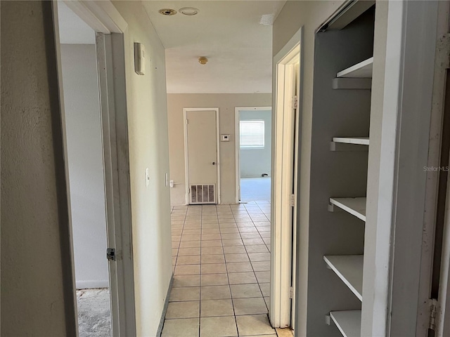 4845 Elese St, Orlando, FL 32811 - hall with light tile patterned floors