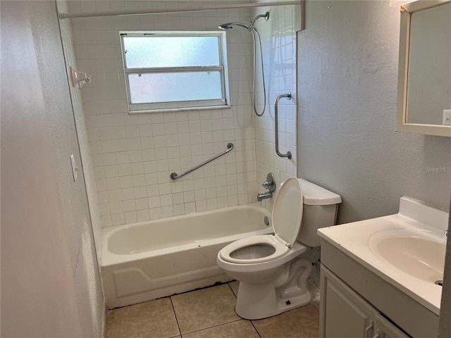 4845 Elese St, Orlando, FL 32811 - full bath featuring tile patterned floors, tub / shower combination, toilet, vanity, and a textured wall