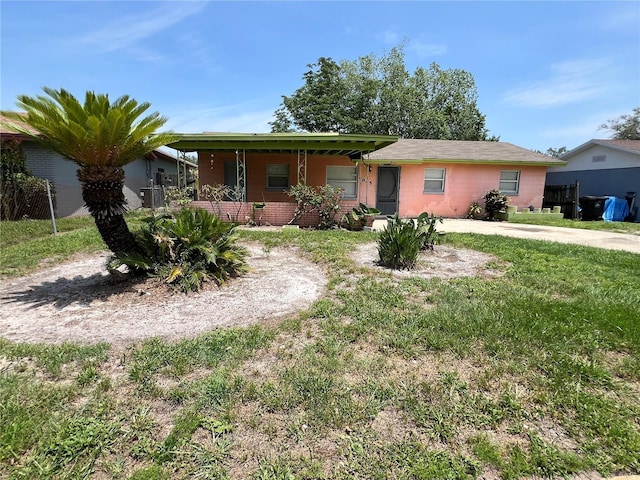 4845 Elese St, Orlando, FL 32811 - ranch-style home featuring driveway