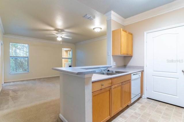 kitchen with visible vents, ornamental molding, a sink, light countertops, and dishwasher