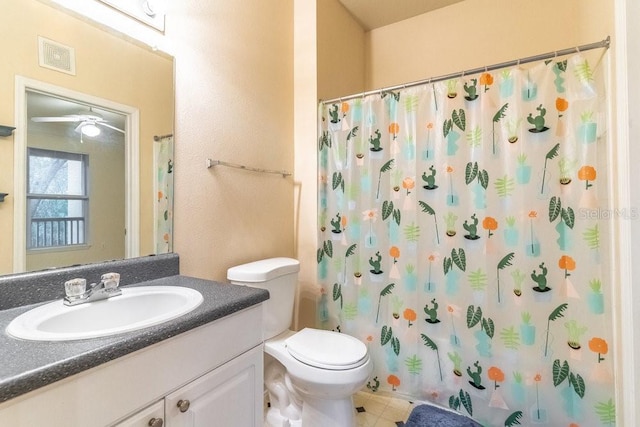 bathroom with vanity, toilet, a shower with curtain, and visible vents