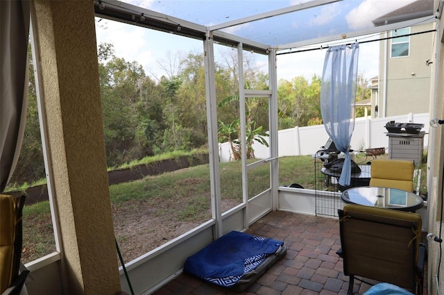 sunroom / solarium with a healthy amount of sunlight