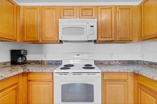 kitchen featuring white appliances