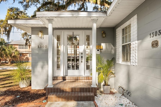 entrance to property with a porch