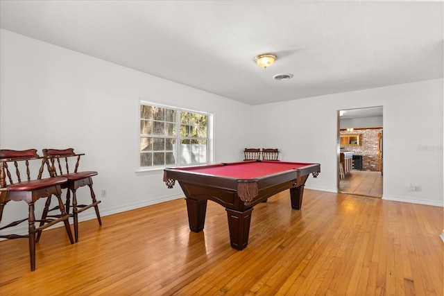 rec room with billiards, baseboards, visible vents, and light wood finished floors