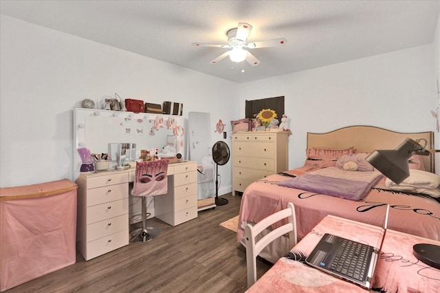 bedroom featuring dark wood-type flooring and ceiling fan