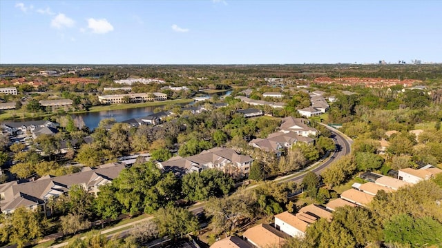 birds eye view of property with a residential view and a water view