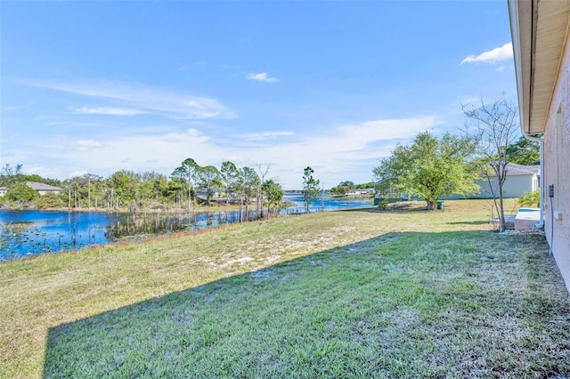 view of yard with a water view