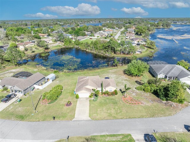 bird's eye view with a residential view and a water view
