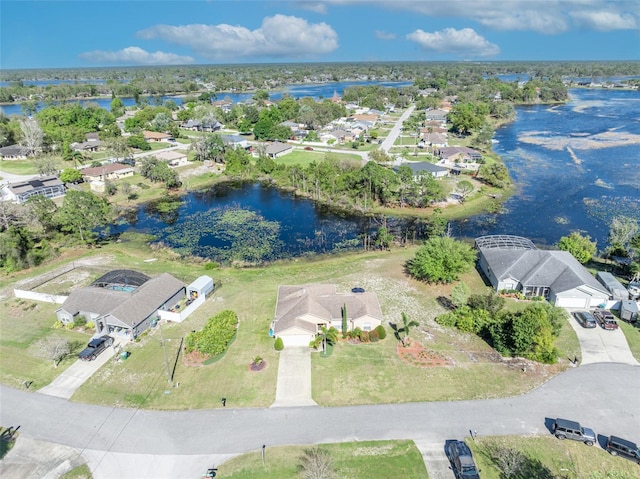 aerial view with a residential view and a water view