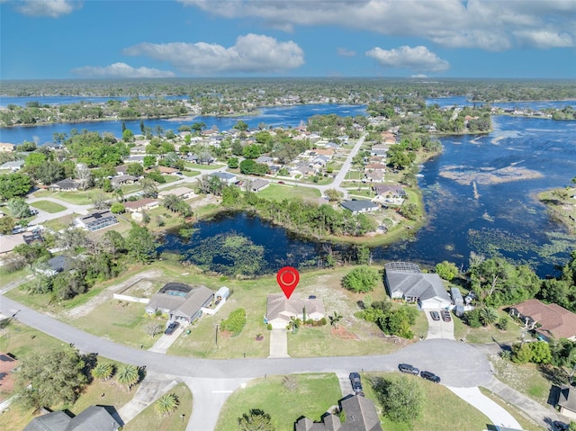 aerial view with a residential view and a water view