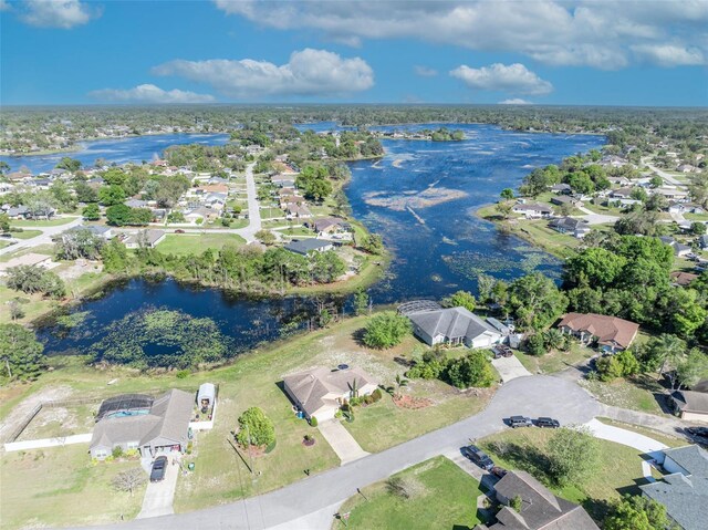 bird's eye view with a residential view and a water view