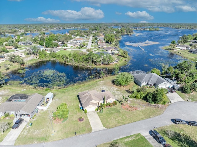 aerial view featuring a residential view and a water view
