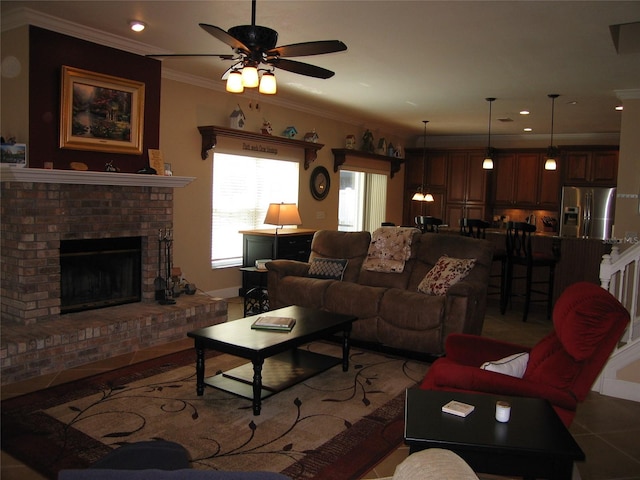 living room with recessed lighting, a fireplace, crown molding, light tile patterned floors, and ceiling fan