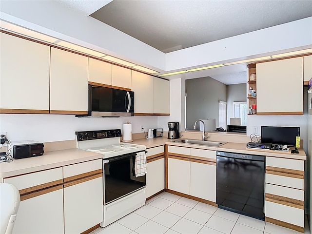 kitchen featuring electric stove, a sink, stainless steel microwave, black dishwasher, and light countertops