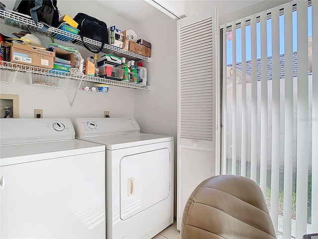 laundry room with independent washer and dryer and laundry area