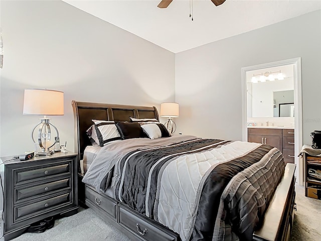 bedroom featuring carpet flooring, ensuite bathroom, and ceiling fan