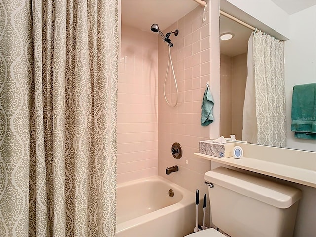 full bath featuring toilet and shower / tub combo with curtain