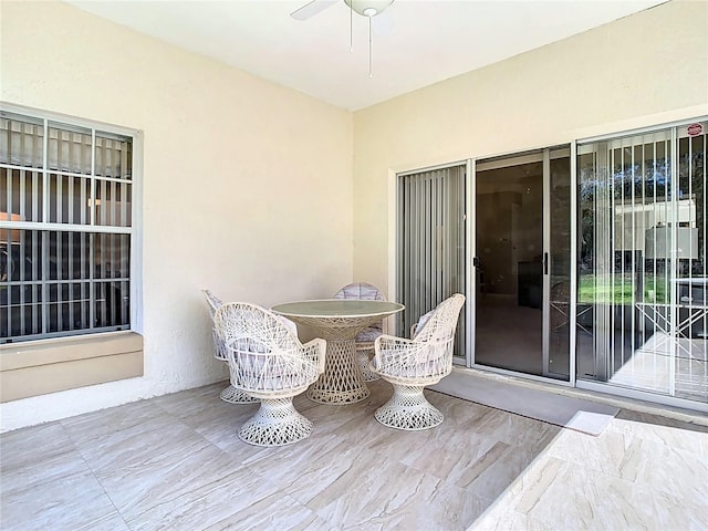 view of patio / terrace featuring a ceiling fan