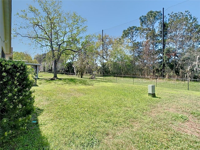 view of yard with fence