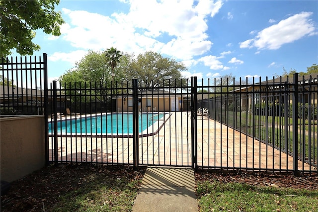 pool featuring fence