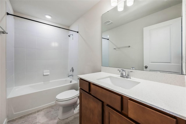 bathroom with vanity, visible vents, bathtub / shower combination, tile patterned floors, and toilet