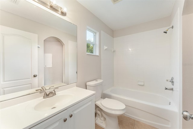 bathroom with tile patterned floors, vanity, toilet, and shower / tub combination