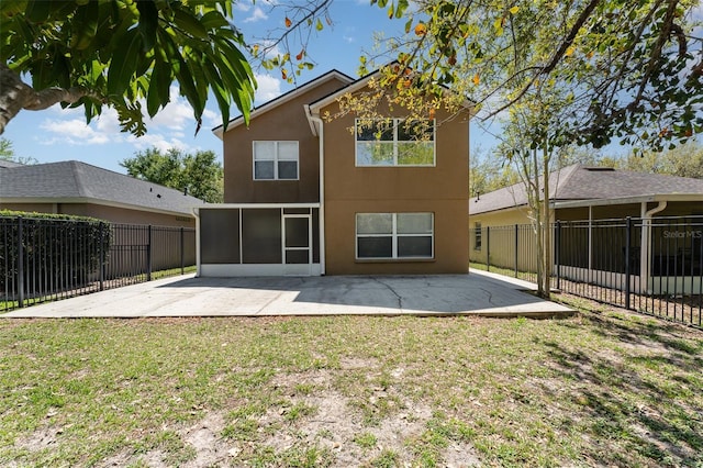 rear view of house featuring a patio, a fenced backyard, and stucco siding