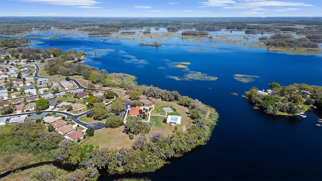 aerial view with a residential view and a water view