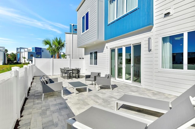 view of patio / terrace featuring an outdoor hangout area and a fenced backyard