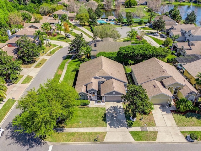 aerial view featuring a residential view and a water view