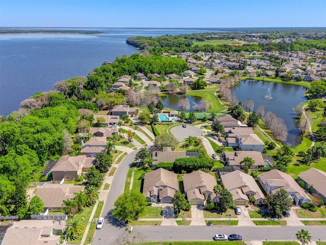 bird's eye view featuring a residential view and a water view