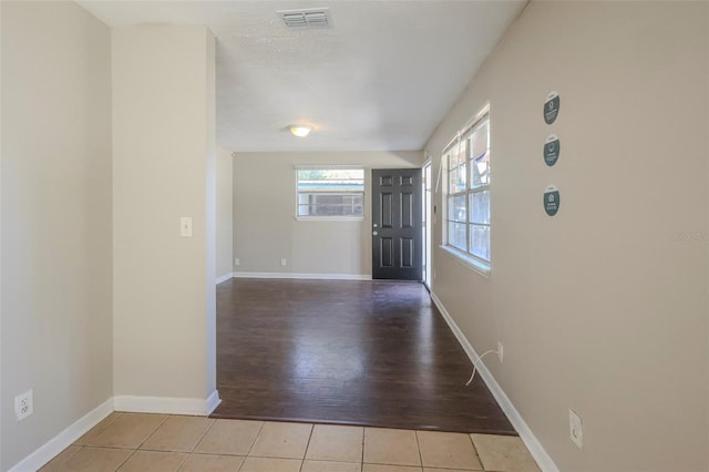 2108 W 15th, Jacksonville, FL 32209 - tiled foyer with baseboards and visible vents