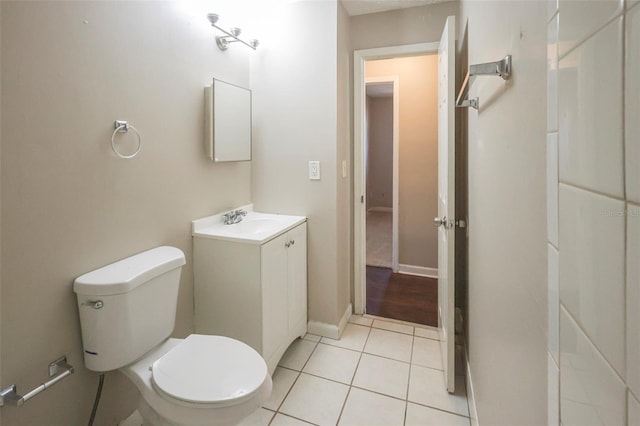 2108 W 15th, Jacksonville, FL 32209 - bathroom featuring tile patterned floors, toilet, vanity, and baseboards