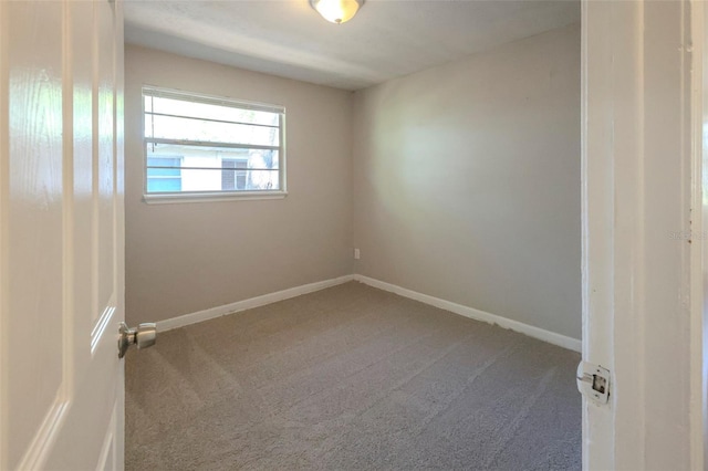 2108 W 15th, Jacksonville, FL 32209 - spare room with carpet flooring and baseboards