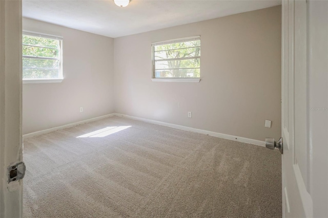 2108 W 15th, Jacksonville, FL 32209 - carpeted empty room with baseboards