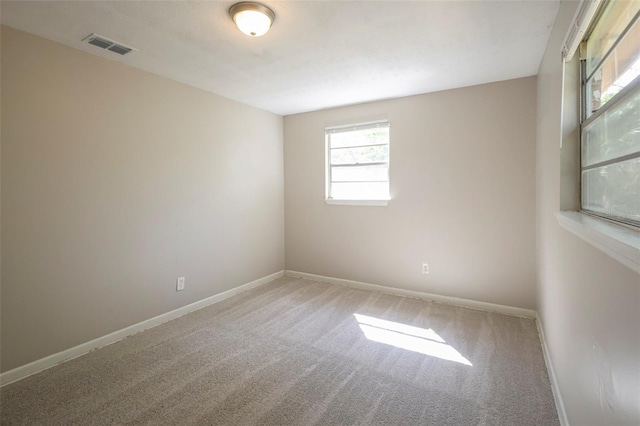 2108 W 15th, Jacksonville, FL 32209 - empty room with visible vents, baseboards, and carpet floors