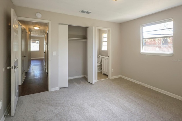 2108 W 15th, Jacksonville, FL 32209 - unfurnished bedroom featuring baseboards, visible vents, carpet floors, and a closet