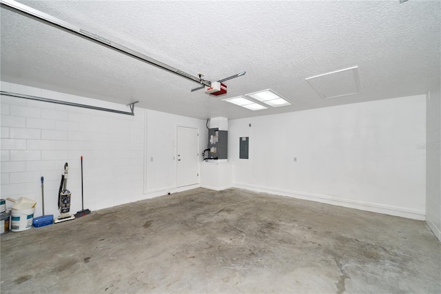 garage featuring electric panel, heating unit, a garage door opener, and concrete block wall