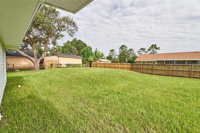 view of yard featuring fence