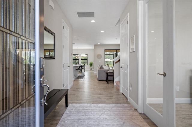 12654 Oak Hill Way, Parrish, FL 34219 - foyer entrance with wood finished floors, baseboards, and recessed lighting