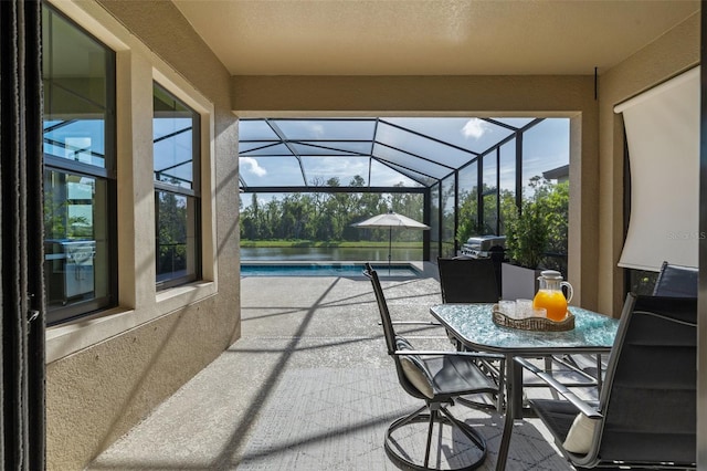 12654 Oak Hill Way, Parrish, FL 34219 - view of patio featuring an outdoor pool, a water view, and glass enclosure
