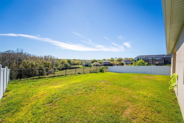 view of yard with a fenced backyard