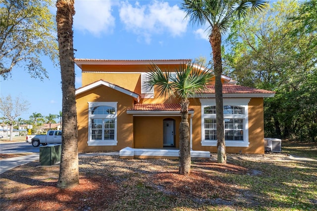 mediterranean / spanish-style house with stucco siding