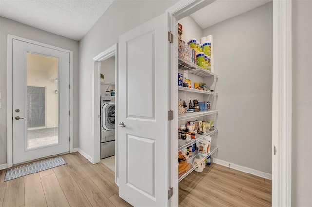 pantry with washer / clothes dryer