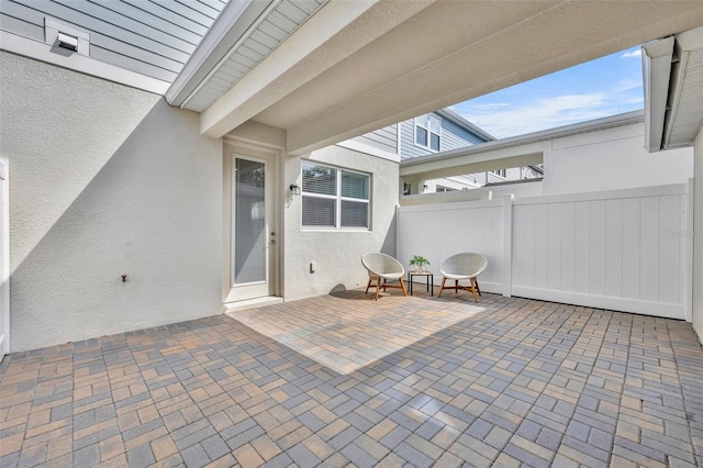 view of patio with fence