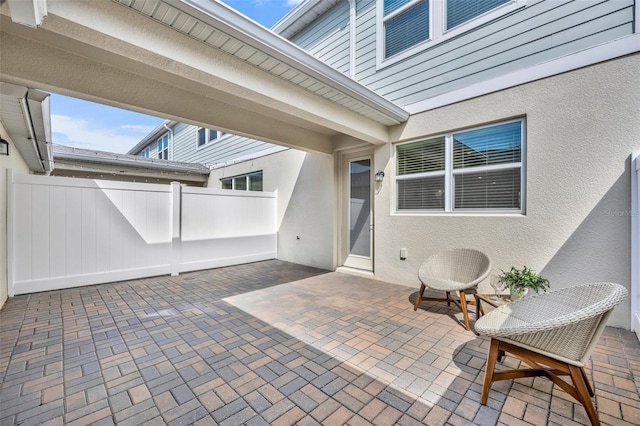 view of patio / terrace with fence