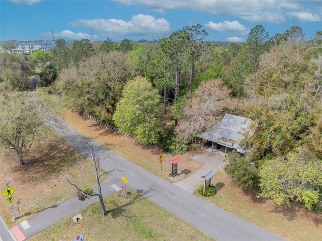 bird's eye view featuring a view of trees