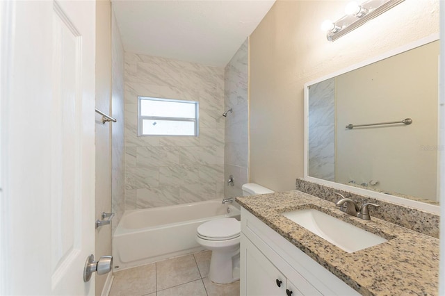 bathroom featuring toilet, tile patterned flooring, bathing tub / shower combination, and vanity