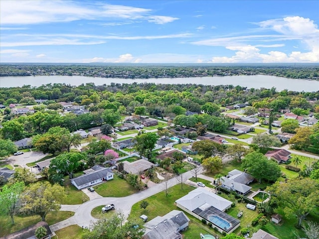 aerial view with a residential view and a water view